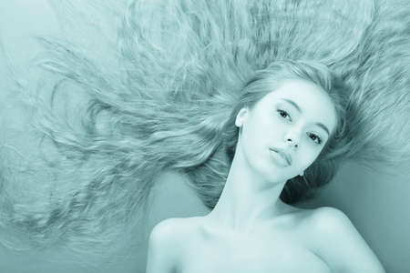 Portrait of a beautiful  professional model. Theme: healthcare, beauty, fashionの写真素材