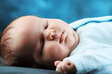Portrait of a beautiful sleeping baby.の写真素材