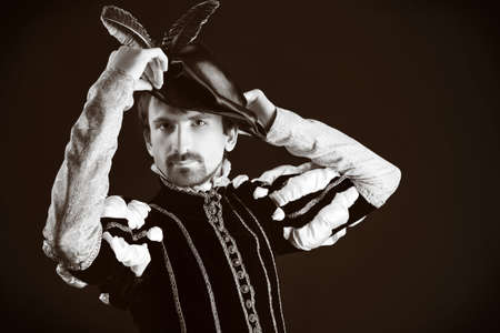 Portrait of a handsome man grandee in 16th century costume. Shot in a studio.の写真素材