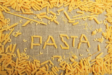 Food theme: conceptual background of uncooked pasta.の写真素材