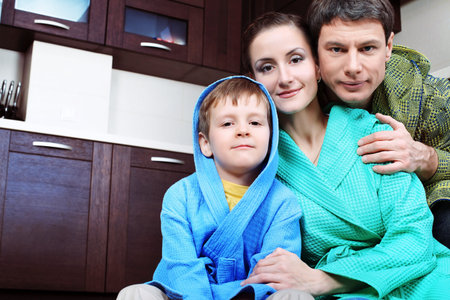 Happy family with a child at home.の写真素材
