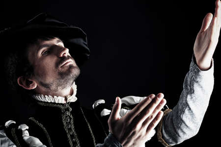 Portrait of a handsome man grandee in 16th century costume. Shot in a studio.の写真素材