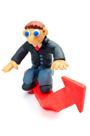 Shot of a plasticine businessman in a suit. Isolated over white background.の写真素材