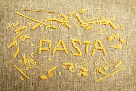 Food theme: uncooked spaghetti background.の写真素材