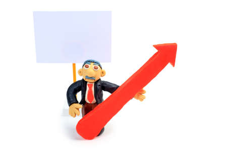 Shot of a plasticine businessman in a suit. Isolated over white background.の写真素材