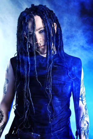 Portrait of a heavy metal musician. Shot in a studio.の写真素材