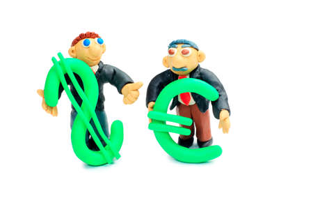 Shot of a plasticine businessmen in a suit with money symbols. Isolated over white background.の写真素材