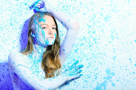 Art project: beautiful woman painted with many vivid colors. の写真素材