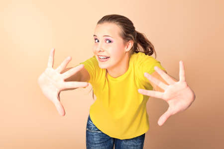 Portrait of a emotional girl teenager.の写真素材