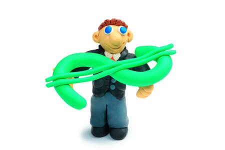Shot of a plasticine businessman in a suit holding money. Isolated over white background.の写真素材
