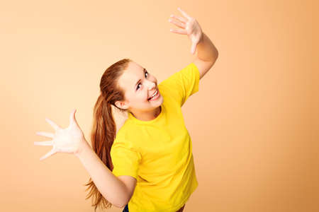 Portrait of a emotional girl teenager.の写真素材