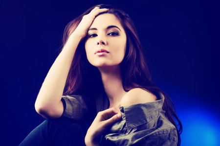 Portrait of a beautiful young woman brunette.