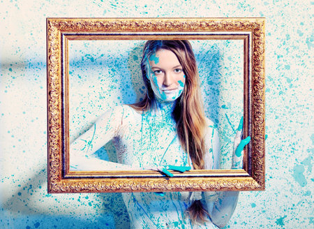 Art project: beautiful woman painted with many vivid colors. の写真素材