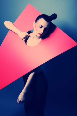 Fashion shot of an attractive model. Make-up. Shapes concept.の写真素材