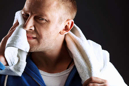 Portrait of a handsome middle-aged man after training.の写真素材