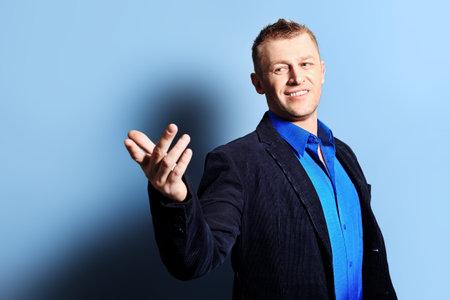Portrait of a handsome man in a suit. Studio shot.の写真素材