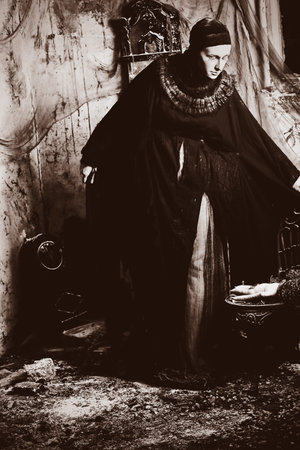 Shot of the woman in old-fashioned dress. 