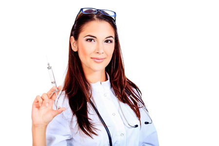 Portrait of a beautiful woman doctor. Isolated over white background.