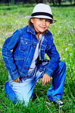 Portrait of a cute boy outdoor.の写真素材