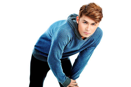 Portrait of a handsome young man. Isolated over white.の写真素材