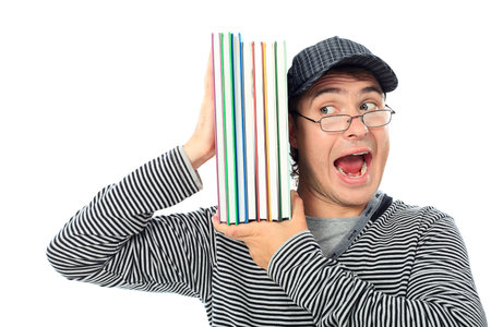 Educational theme: shouting student with books. Isolated over white background.の写真素材