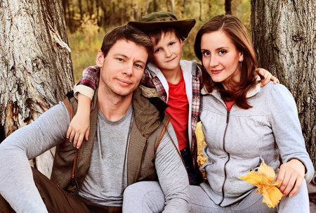 Happy family having a rest outdoor in tent.の写真素材