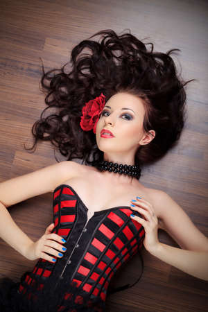 Portrait of a sexy beautiful woman posing at studio.の写真素材