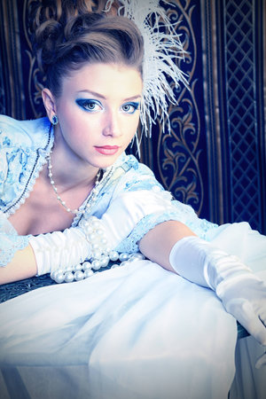 Portrait of the elegant woman in medieval era dress. 