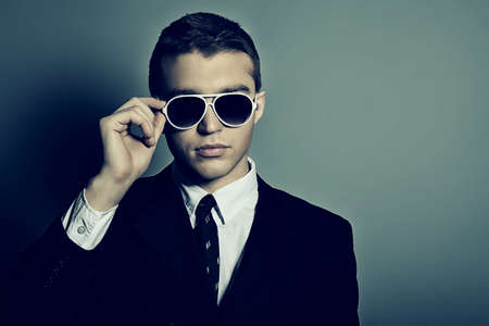 Portrait of a handsome young man in a suit. Shot in a studio.の写真素材