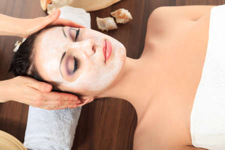 Portrait of a woman with spa mask on her face. Healthcare, medicine.の写真素材