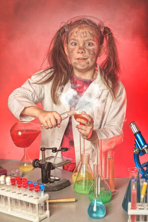 Little girl is making science experiments. Education.の写真素材
