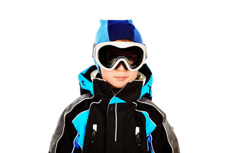 Portrait of a little boy in skier suit. Isolated over white.の写真素材