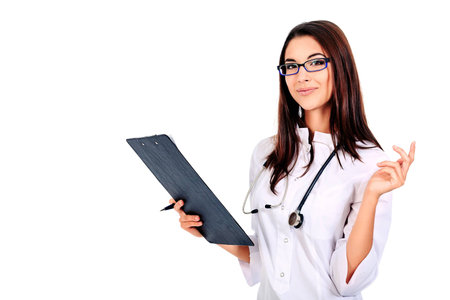 Portrait of a beautiful woman doctor. Isolated over white background.の写真素材