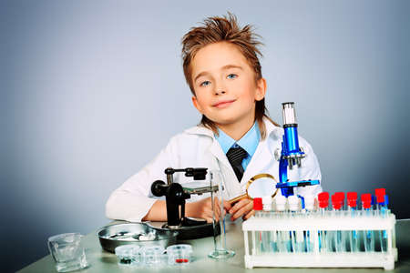 Little boy is making science experiments. Education.の写真素材