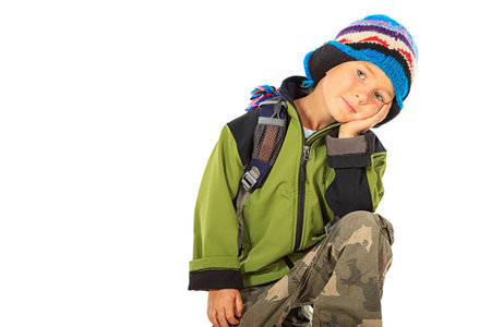 Portrait of a cute 5 year boy. Isolated over white background.