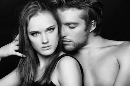 Shot of a passionate young people in love.の写真素材