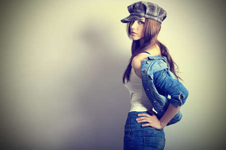 Shot of an attractive fashionable girl posing in studio.の写真素材