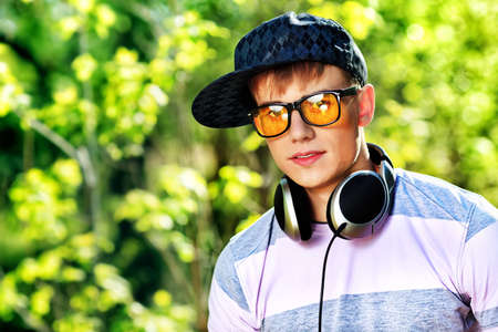 Portrait of a young man student outdoors.の写真素材