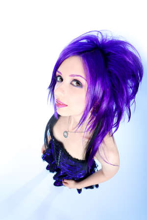 Portrait of a punk girl. Isolated over white background.の写真素材