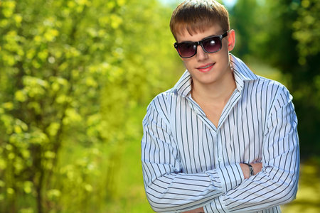 Portrait of a handsome young man outdoors.の写真素材