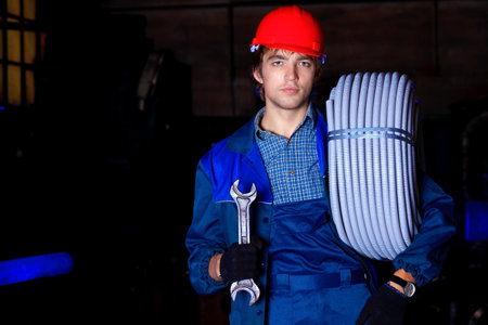 Industry: a worker at a manufacturing area.