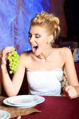 Beautiful bride in a luxurious restaurant. Vintage style.の写真素材