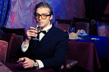 Portrait of a handsome groom on his wedding celebration.の写真素材