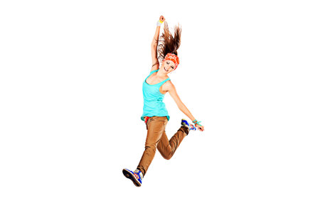 Modern girl dancing hip-hop at studio.