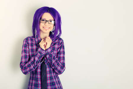 Portrait of a punk girl with purple hair. の写真素材