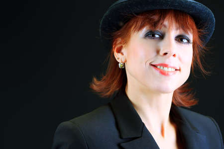 Portrait of a woman actress in style of 1930s - 1940s. Studio shot. の写真素材