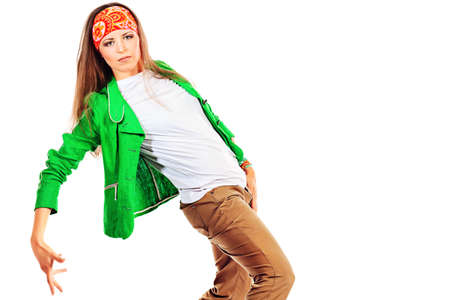 Modern girl dancing hip-hop at studio. Isolated over white.の写真素材