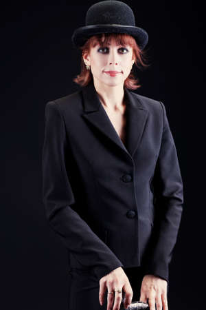 Portrait of a woman actress in style of 1930s - 1940s. Studio shot. の写真素材