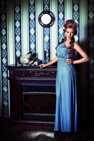 Beautiful romantic lady posing in the  vintage interior.の写真素材