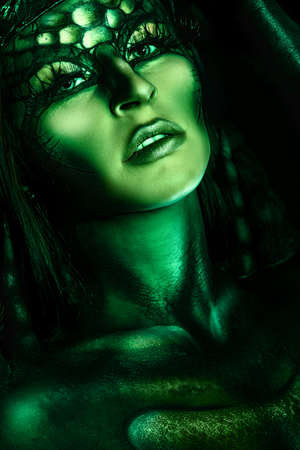 Beautiful and scary devil woman. Art project.の写真素材